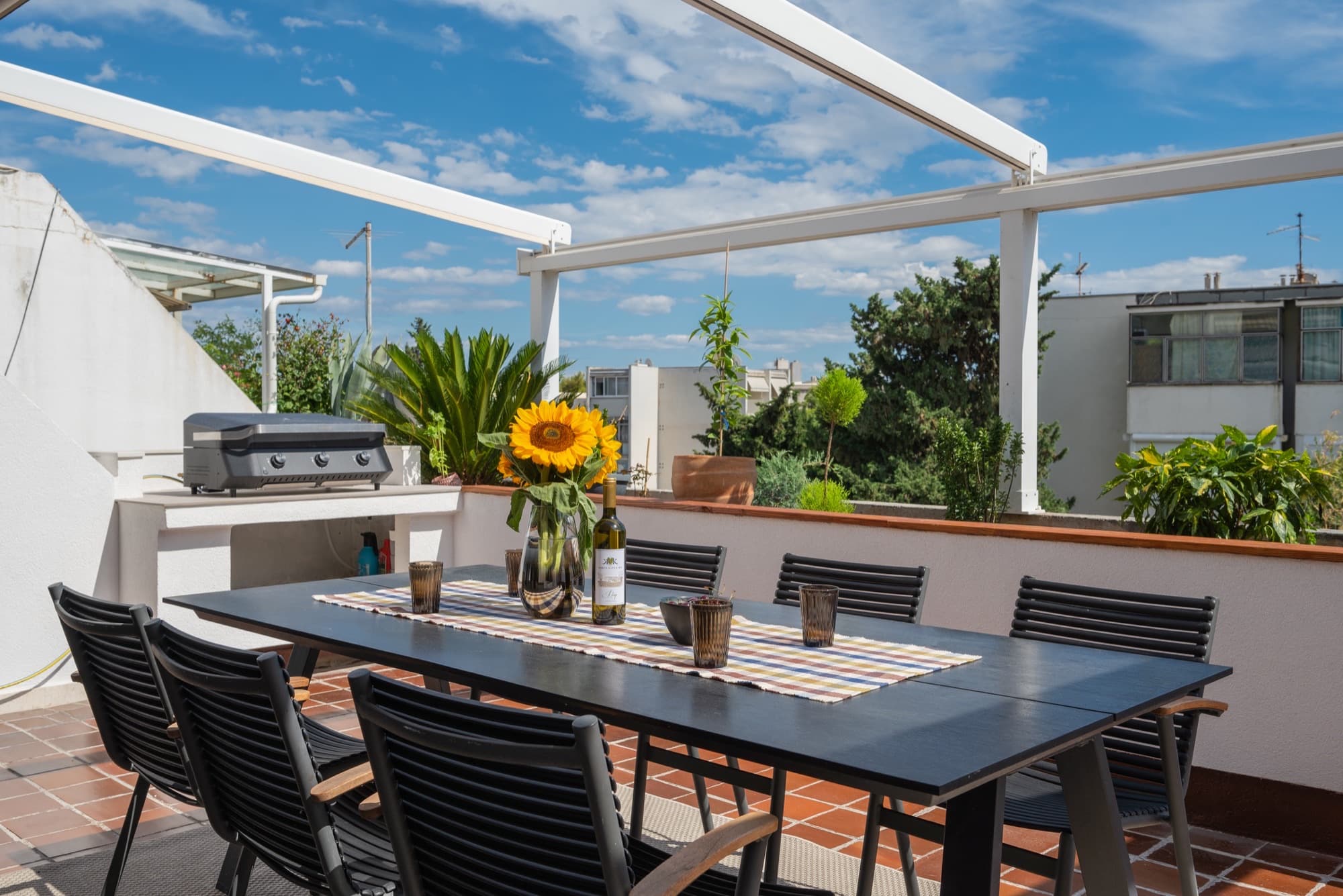 Terrace dining table under the sun